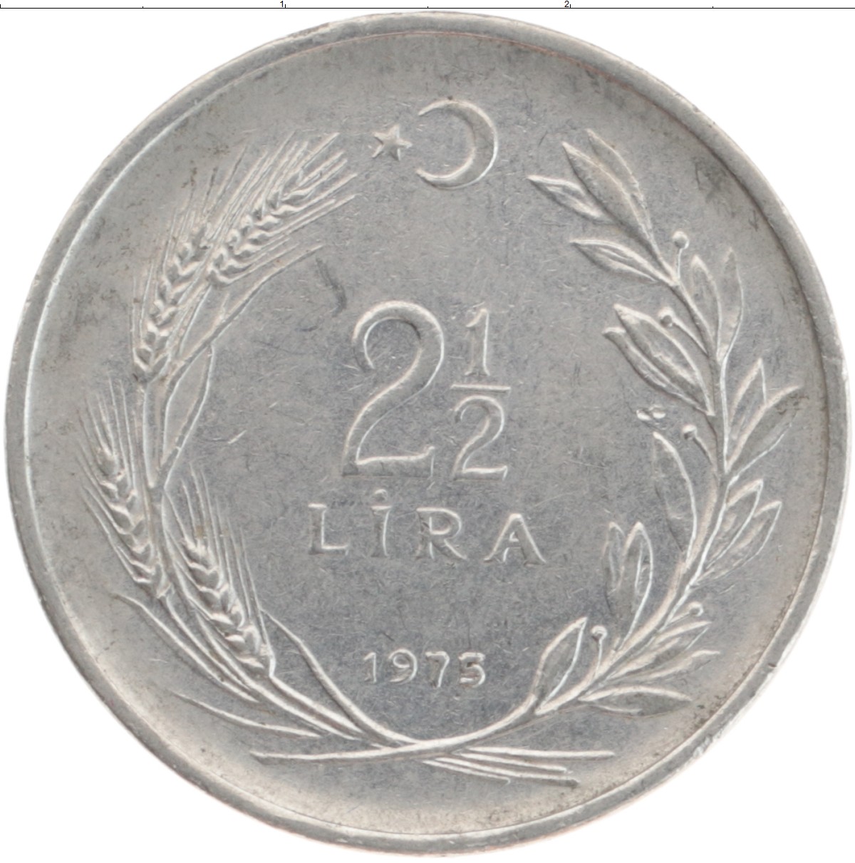 Монета 2 1/2 лиры Турции 1973 года Медно-никель