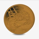 Читать новость нумизматики - Оранжевая титановая монета с изображение краба